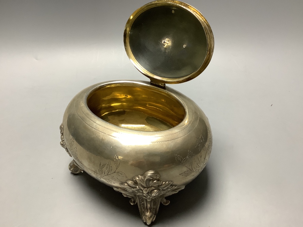 A late 19th century Russian 84 zolotnik oval sugar box with hinged cover, by T. Werner?, height 11cm, 10.5 oz.
